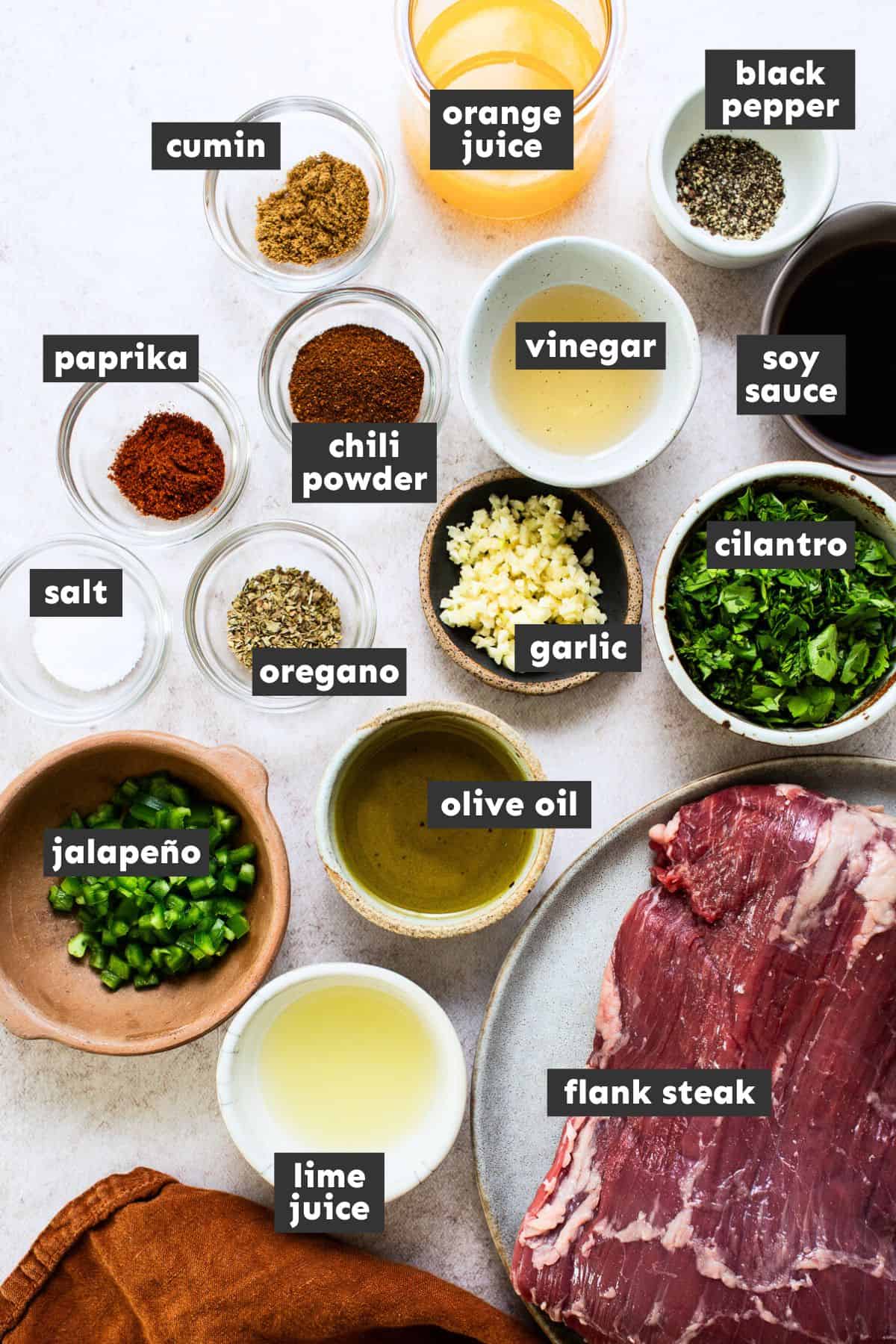 Ingredients for carne asada on a table.