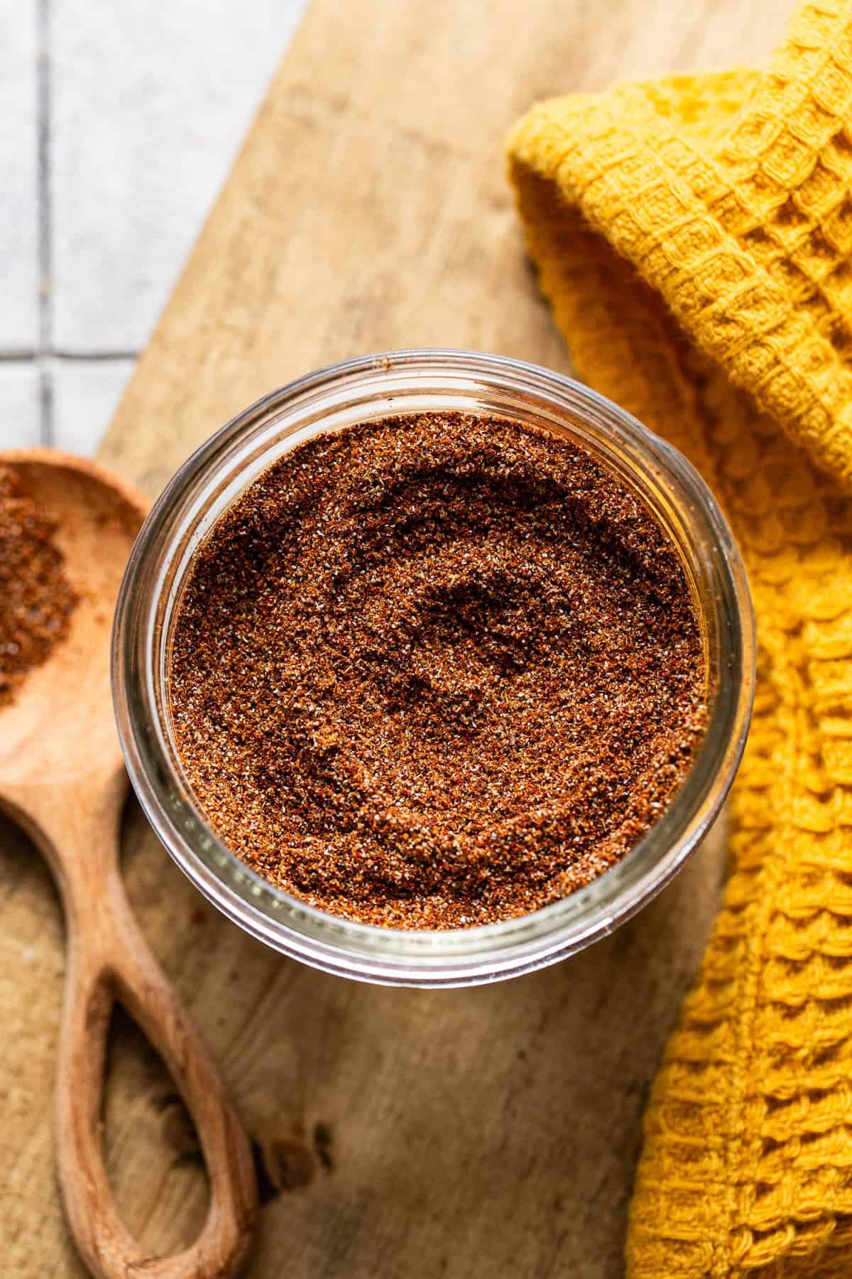 Homemade taco seasoning stored in a jar.